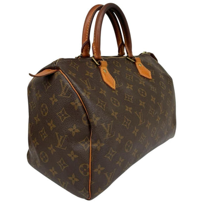 Louis Vuitton beige and brown monogram coated canvas shopping tote with padlock detail.
