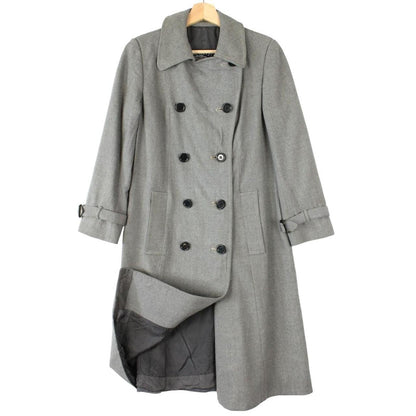 Burberry grey double breasted wool trench coat with classic check lining and logo buttons.