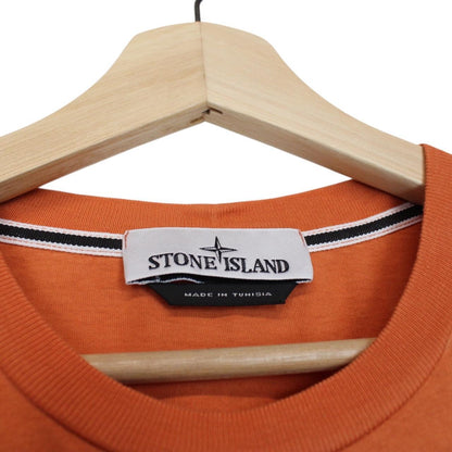 Stone Island orange short sleeve t-shirt with logo print and cotton material.