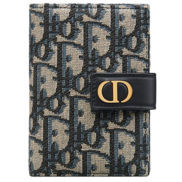 Dior blue card holder featuring Oblique jacquard pattern and dandelion design.