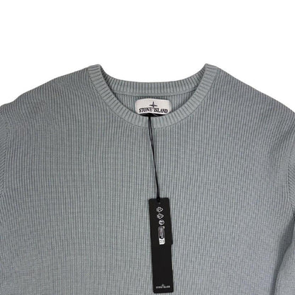Stone Island grey waffle knit jumper with logo patch and organic cotton material.