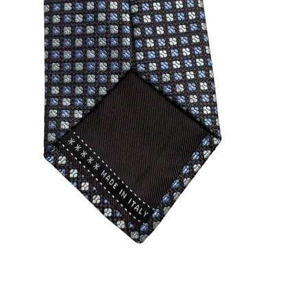Ermenegildo Zegna blue silk tie with subtle sheen and logo detail.