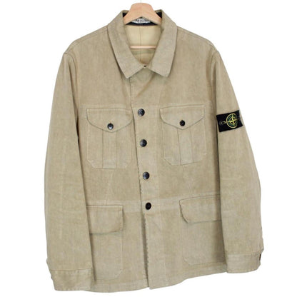 Stone Island beige multi-pocket jacket with logo patch and linen material.