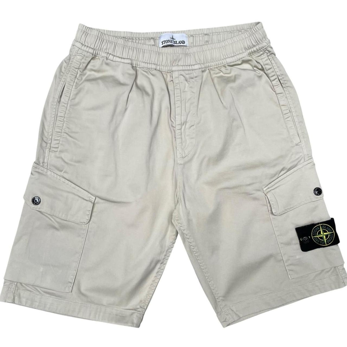 Stone Island beige cargo shorts with logo patch and multiple pockets.
