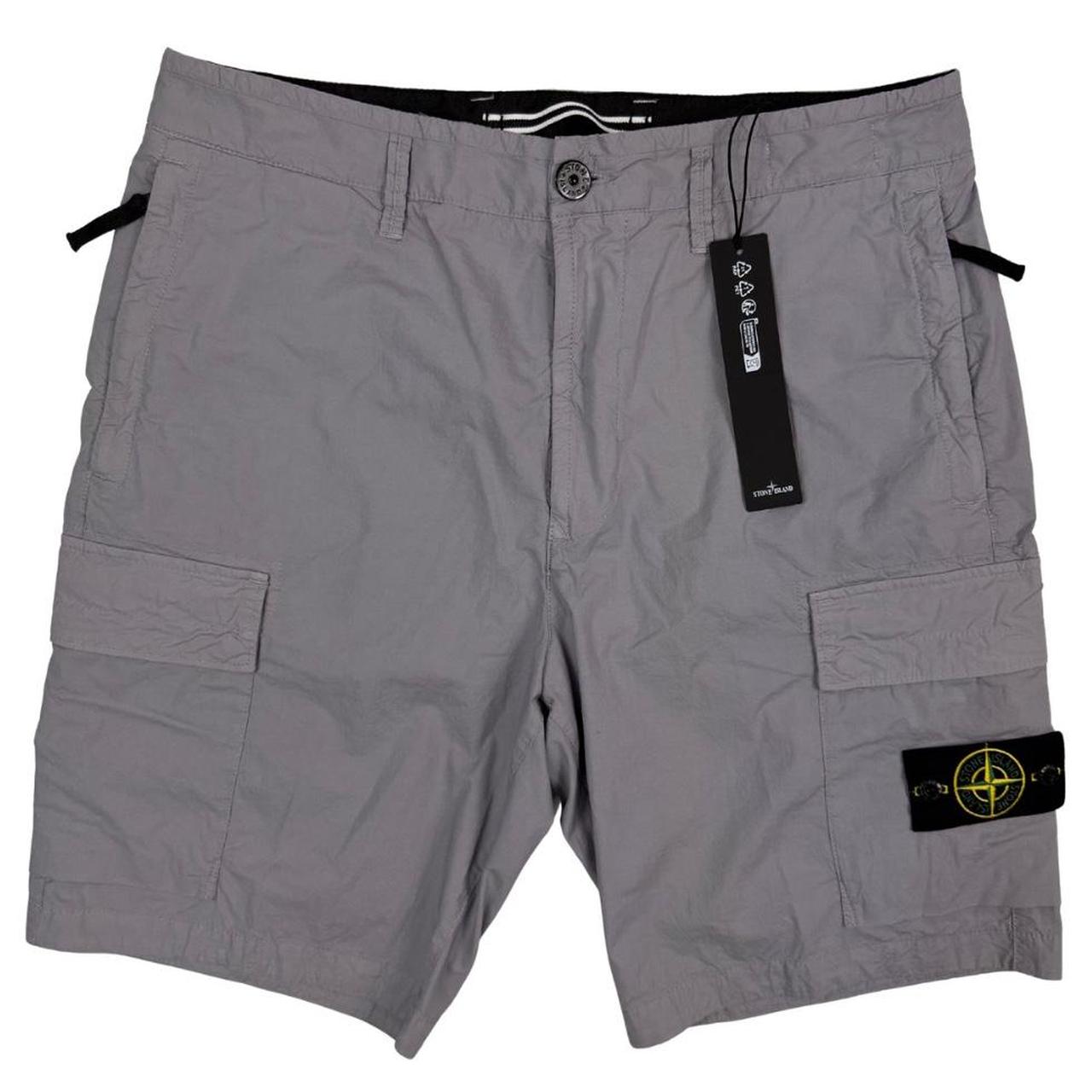 Stone Island grey cargo shorts with logo patch and multiple pockets in cotton material.
