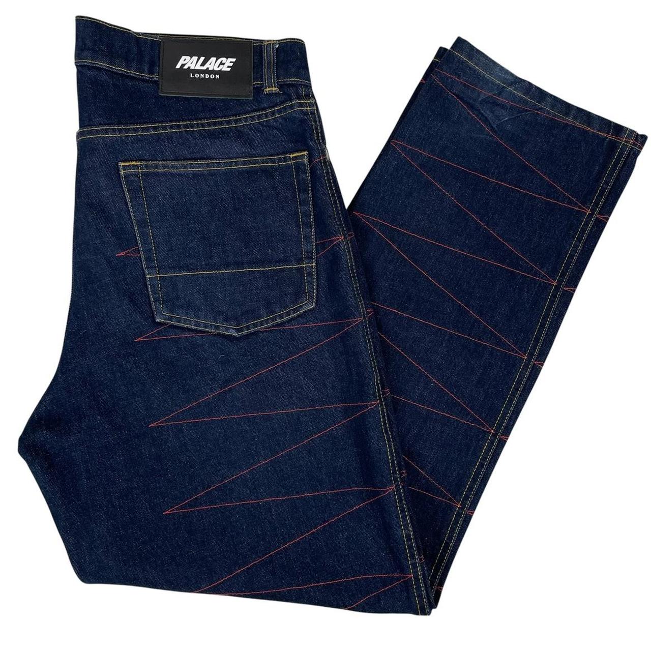 Palace straight jeans navy blue with red embroidered details and logo patch.