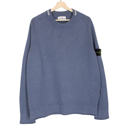 Stone Island blue wool knit jumper with logo patch and ribbed cuffs.