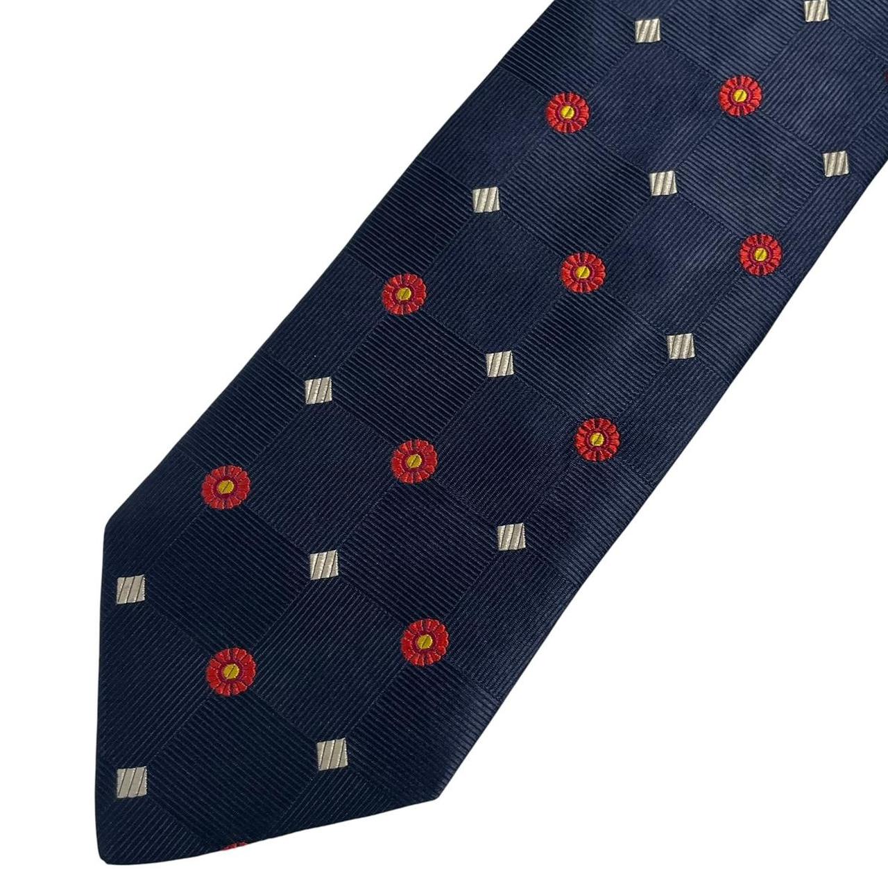 Ermenegildo Zegna navy blue silk tie with subtle sheen and elegant texture.