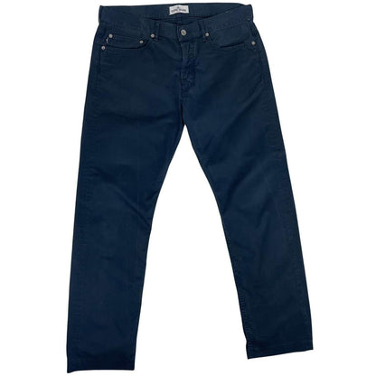 Stone Island navy blue trousers with RE-T fit, cotton material, and iconic compass logo.