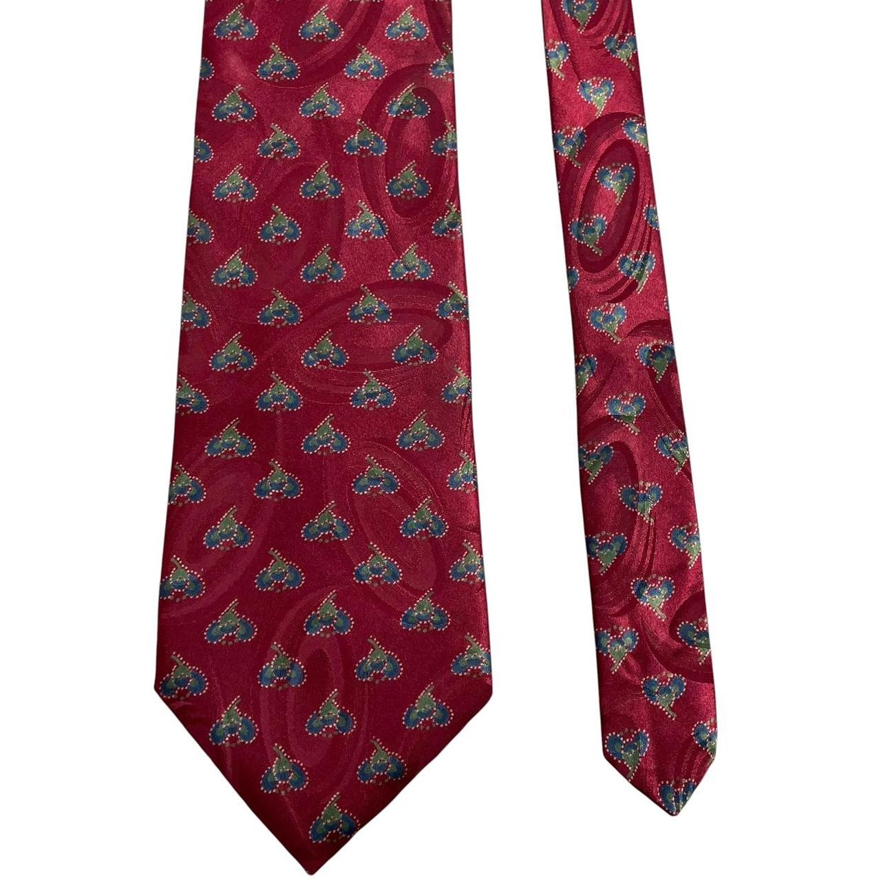 Christian Dior burgundy tie smooth polyester fabric with vintage design.