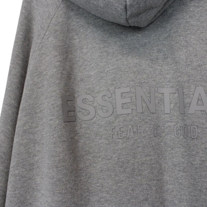 Essentials grey hoodie jumper with oversized fit and subtle logo detail.