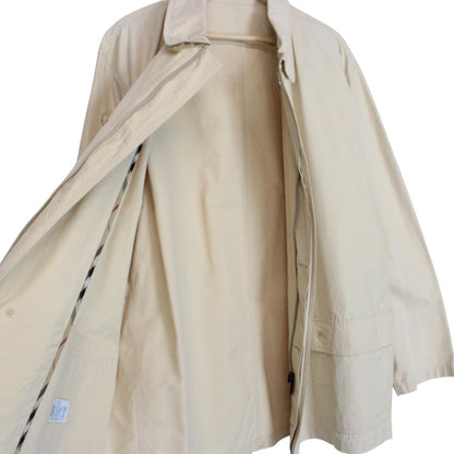Burberry beige coat with classic check pattern and logo detail on collar.