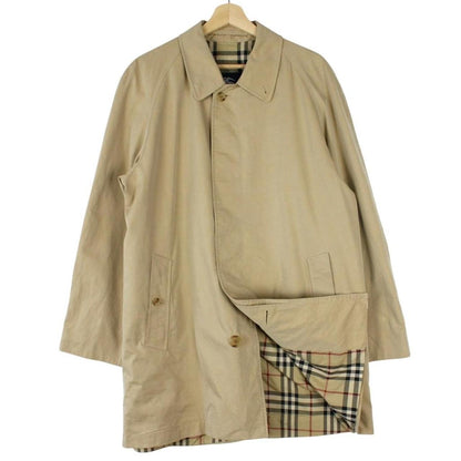 Burberry tan brown single breasted cotton overcoat with logo detail and classic design.
