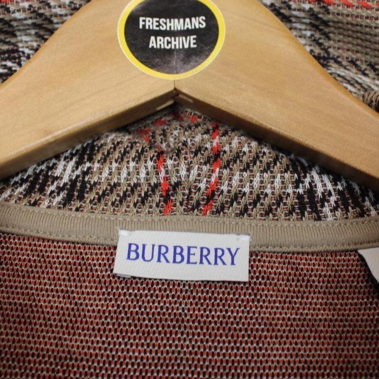 Burberry brown hoodie with Nova Check pattern and full zip, cotton blend material.