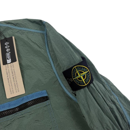 Stone Island green nylon metal overshirt jacket with full zip and logo patch.