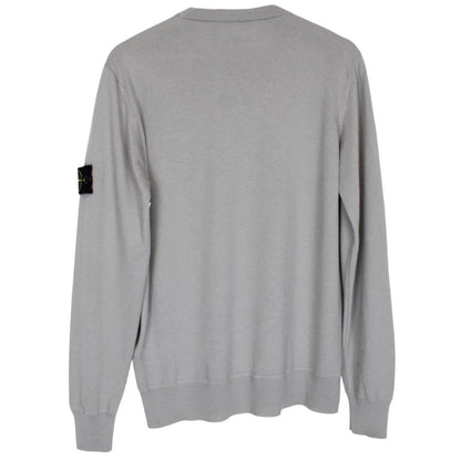Stone Island grey wool knit jumper with logo patch and subtle wear marks.
