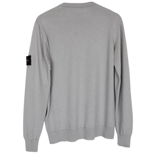Stone Island grey wool knit jumper with logo patch and subtle wear marks.