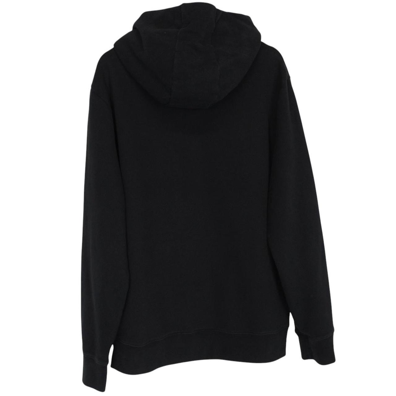 Moncler black hoodie jumper featuring logo patch and cotton material.