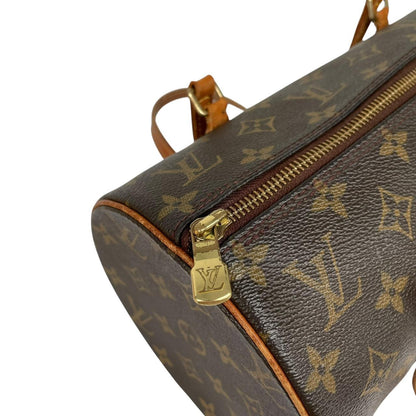 Louis Vuitton duffel bag brown and tan monogram canvas with logo and piping details.