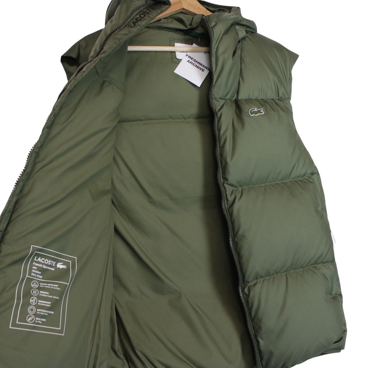 Lacoste khaki green bodywarmer full zip with signature crocodile logo and water-repellent material.
