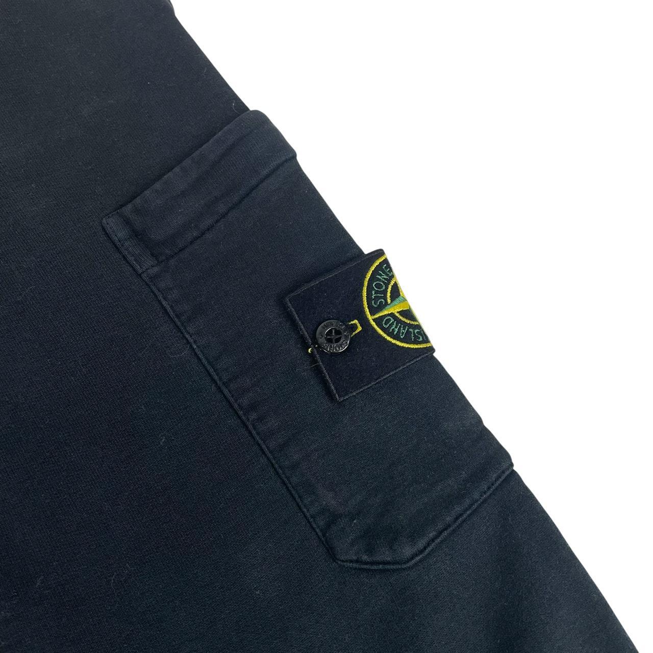 Stone Island navy blue joggers with logo patch and cotton material, pre-owned condition.