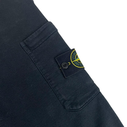 Stone Island navy blue joggers with logo patch and cotton material, pre-owned condition.