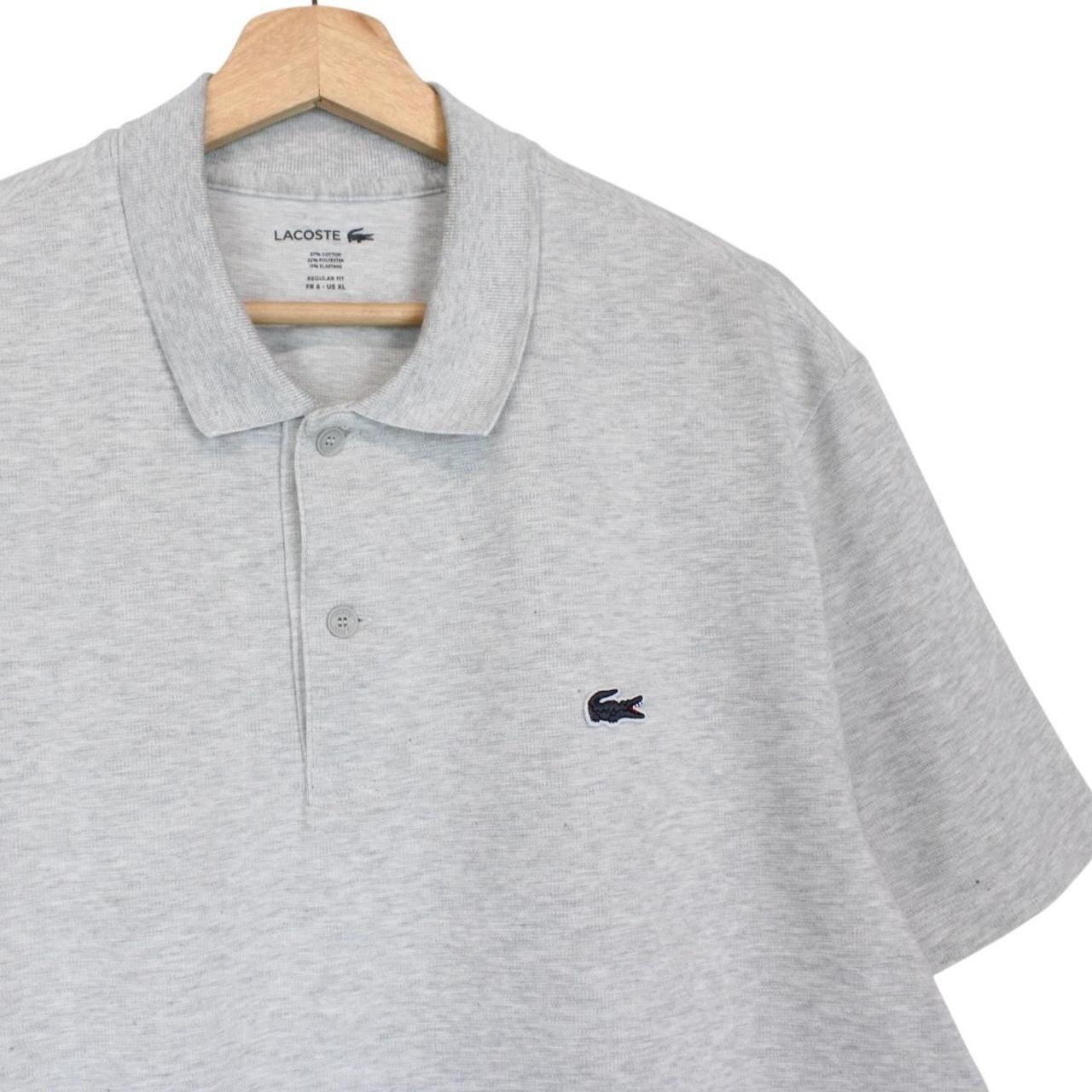 Lacoste grey short sleeve cotton polo shirt with embroidered crocodile logo.