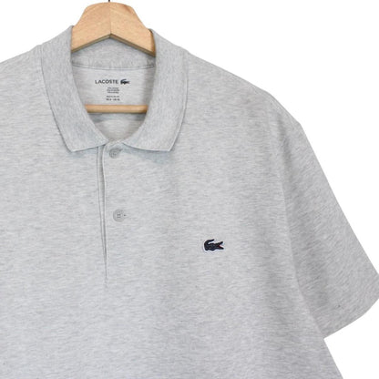 Lacoste grey short sleeve cotton polo shirt with embroidered crocodile logo.