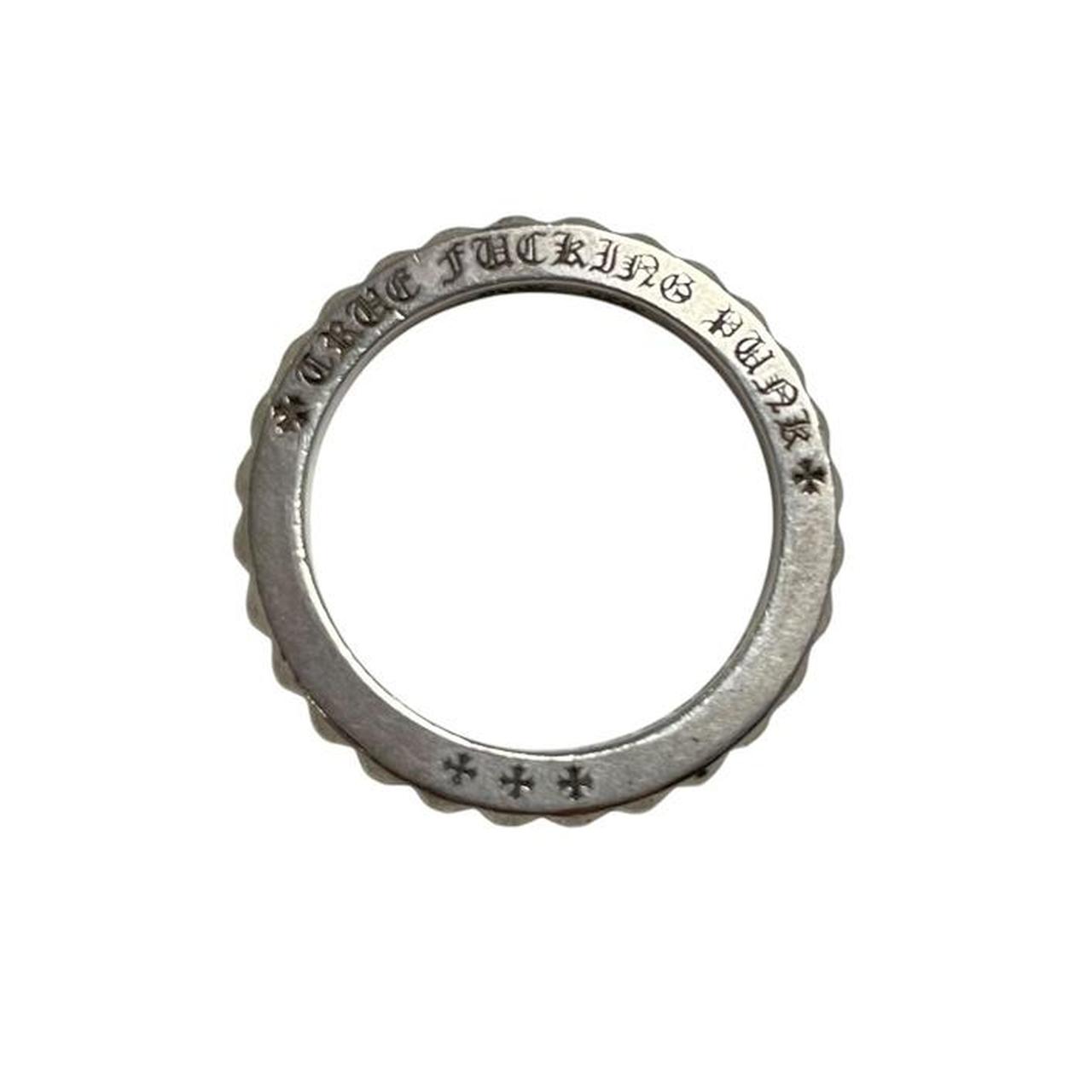 Chrome Hearts silver 3mm cross ring with engraved logo and minor scratches.