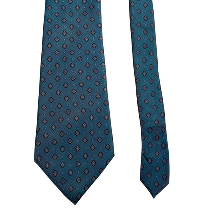 Christian Dior blue silk tie with subtle sheen and classic design.