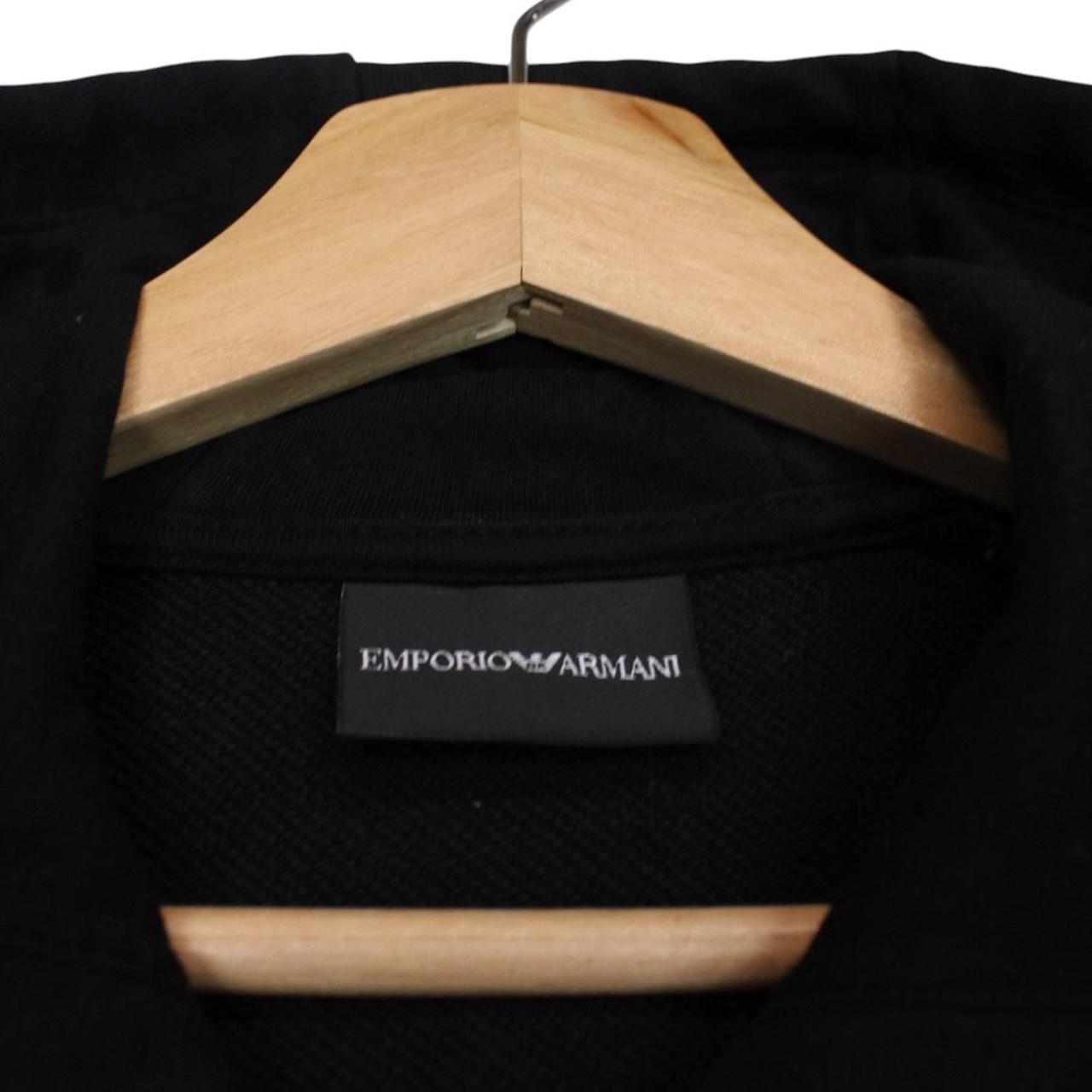 Emporio Armani black full zip hoodie with logo detail and soft cotton material.