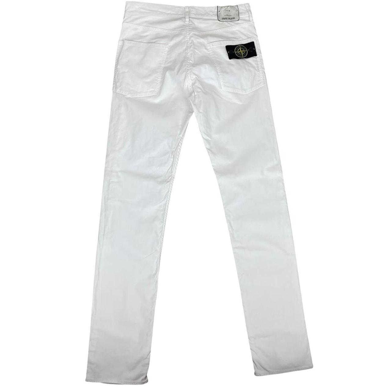 Stone Island white slim fit cotton trousers with logo patch and front mark.