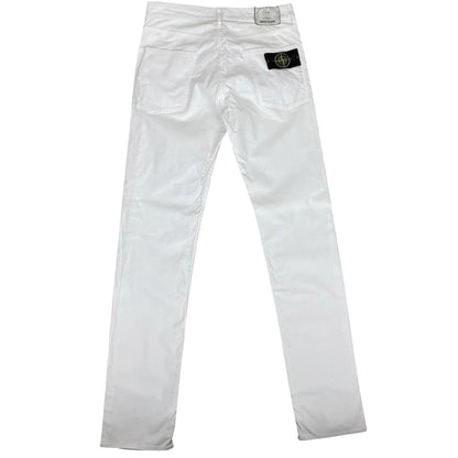 Stone Island white slim fit cotton trousers with logo patch and front mark.