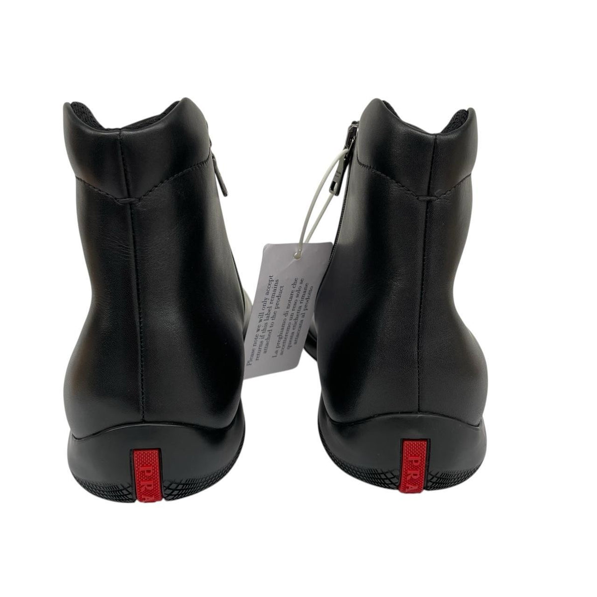 Prada black calfskin leather ankle boots with logo detail and original dust bags.