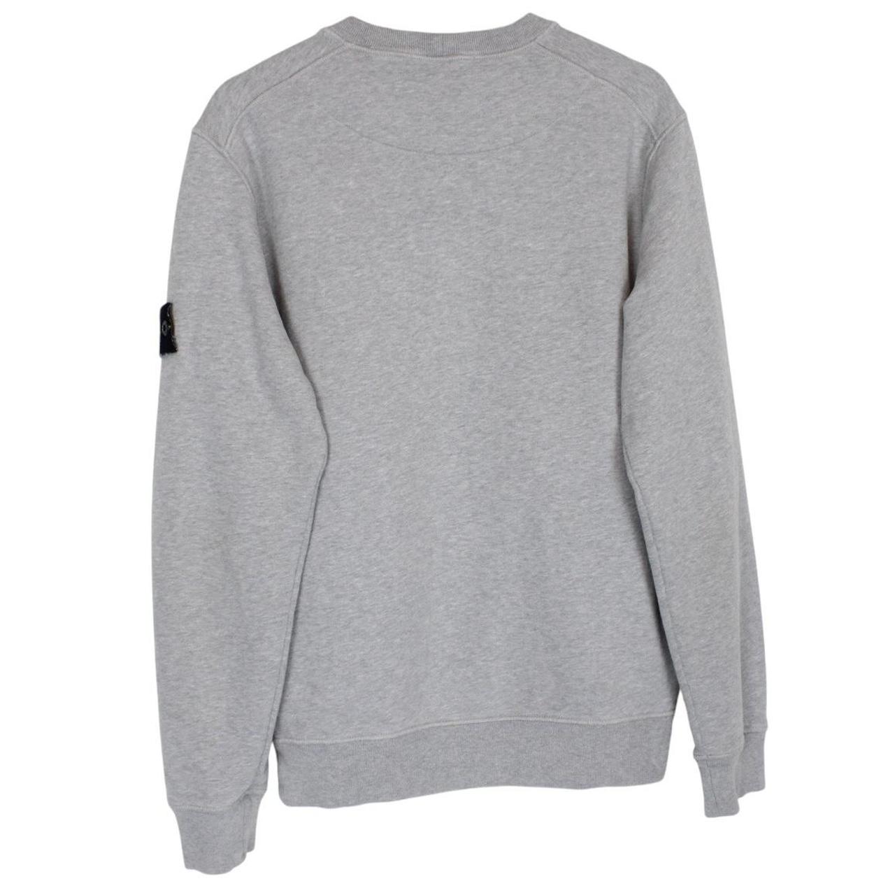 Stone Island grey cotton sweatshirt with logo patch and faint mark on sleeve.