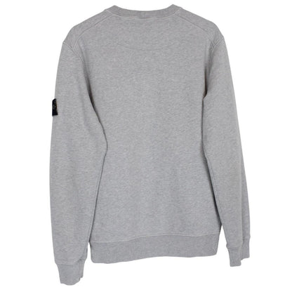 Stone Island grey cotton sweatshirt with logo patch and faint mark on sleeve.