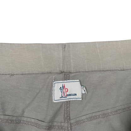 Moncler grey jogger shorts cotton material with logo detail and minor marks.