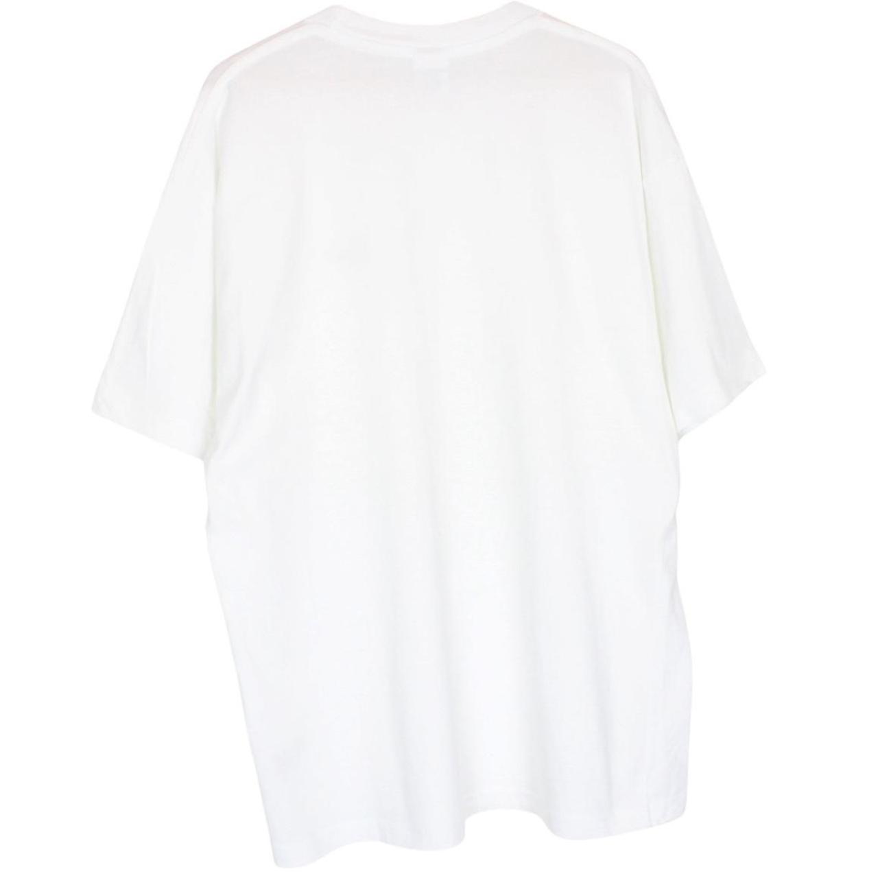 Nike white short sleeve cotton t-shirt with pocket and vintage logo detail.
