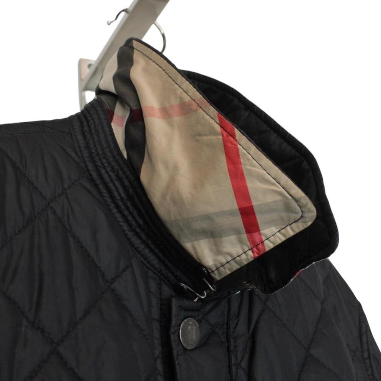 Burberry black quilted field jacket with Nova Check lining and diamond pattern.