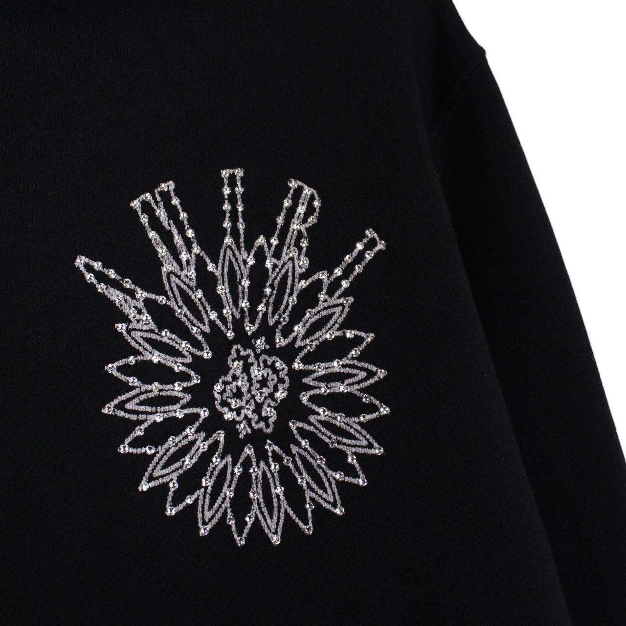 AMIRI black hoodie with rhinestone embellishments and crystal stick poke details.