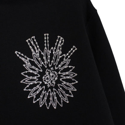 AMIRI black hoodie with rhinestone embellishments and crystal stick poke details.