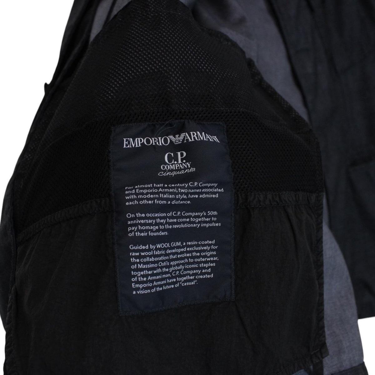 CP Company navy blue jacket garment dyed wool with logo details and gum finish.