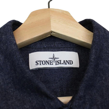 Stone Island navy blue denim overshirt with logo patch and button-up front.