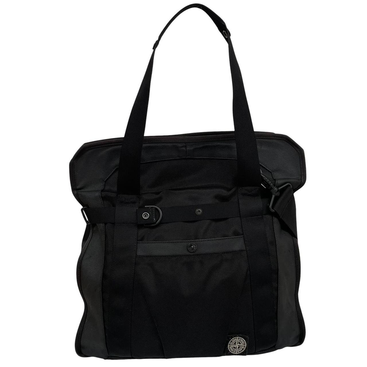 Stone Island black nylon tote bag with logo patch and crossbody strap.