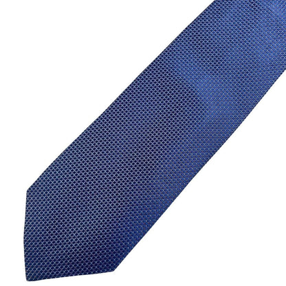 Hugo Boss blue silk tie with smooth texture and subtle sheen.
