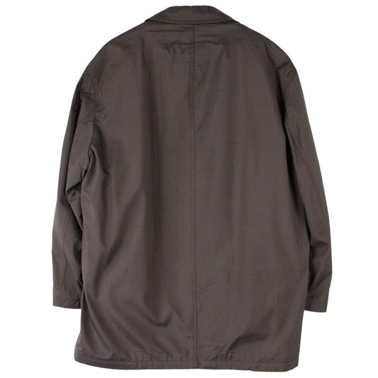 Burberry brown quilted coat featuring iconic Nova Check pattern and removable wool lining.