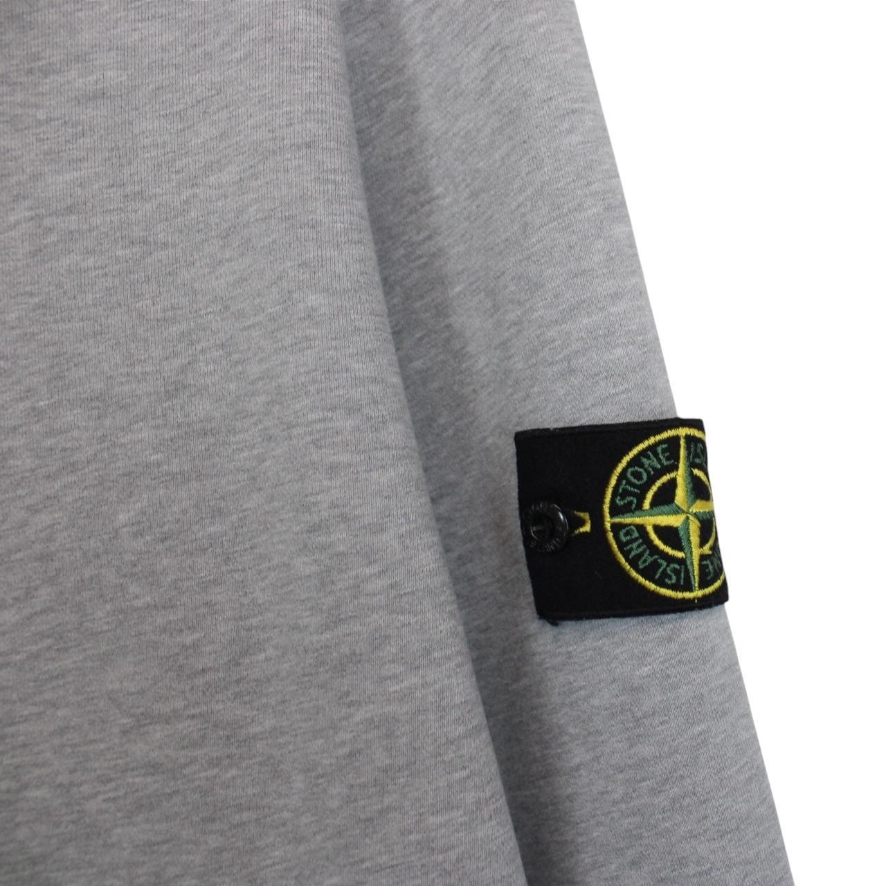 Stone Island grey cotton hoodie with iconic compass logo and drawstring hood.