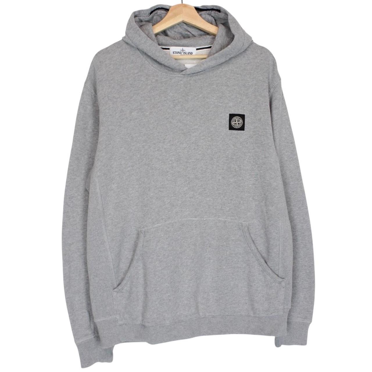 Stone Island grey cotton hoodie with iconic compass logo and drawstring hood.