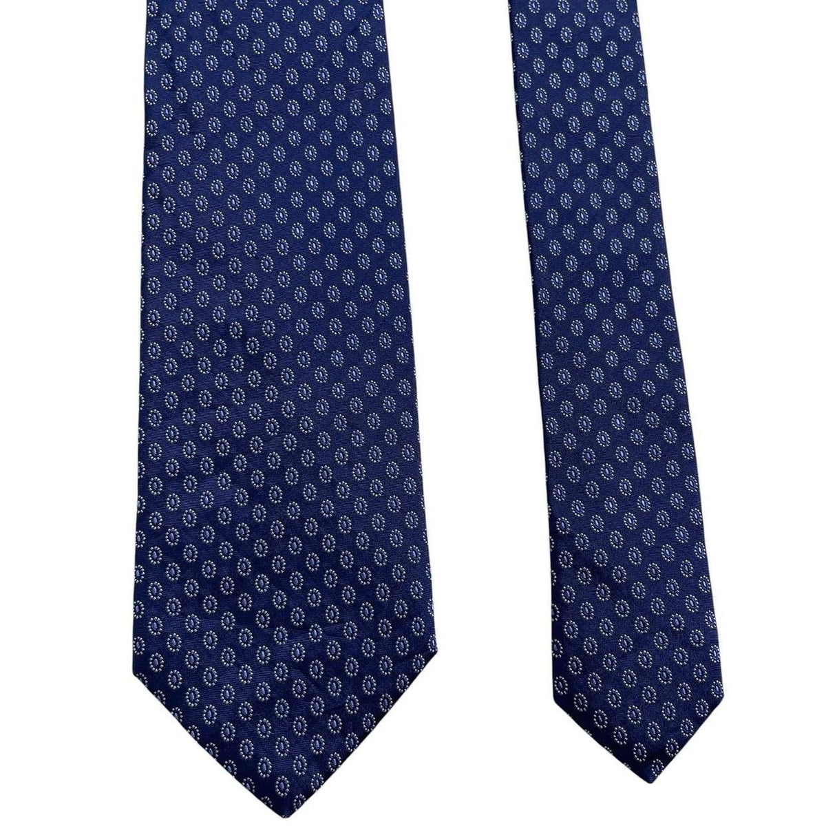 Hugo Boss blue silk tie with smooth texture and subtle sheen.
