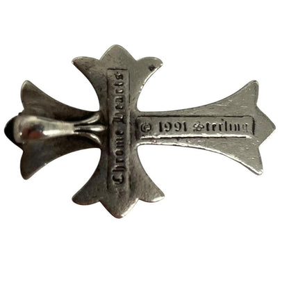 Chrome Hearts silver cross pendant with tarnished finish and vintage 1991 design.